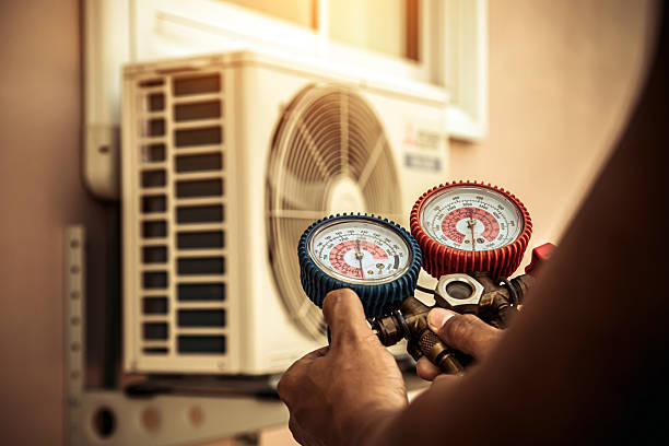 Professional Air Conditioning Service technician working in Portland, TN